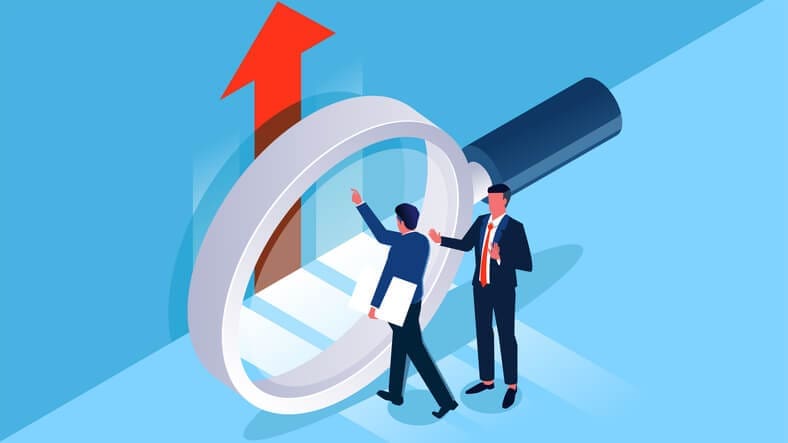 Business professionals examining growth opportunities through a magnifying glass, representing search visibility vs search authority.